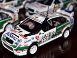 Přes 200 modelů závoďáků na výstavě doplňují i kombinézy a trofeje jezdců rally Přes 200 modelů závoďáků na výstavě doplňují i kombinézy a trofeje jezdců rally